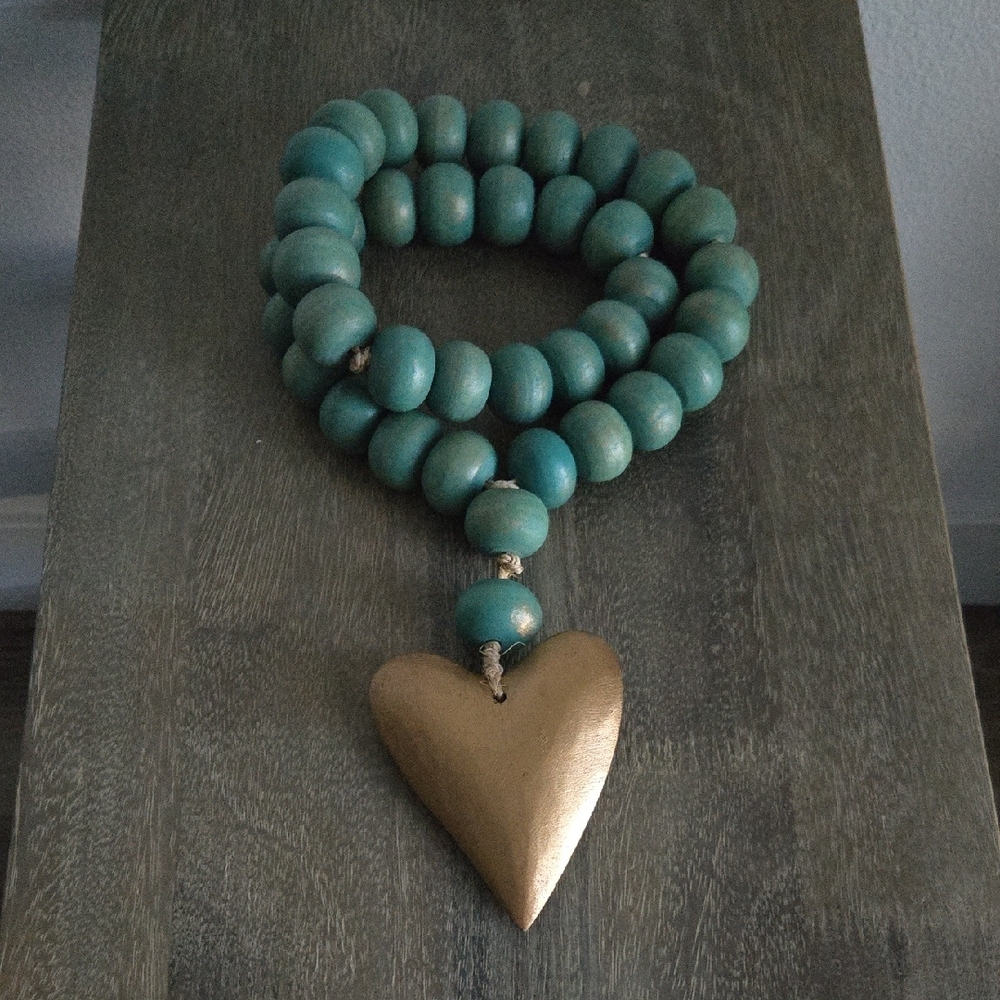 Aqua Blue Mango Wood Bead Strand With Gold Heart